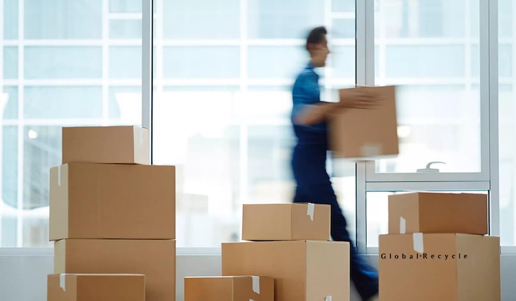 man carrying cardboard box